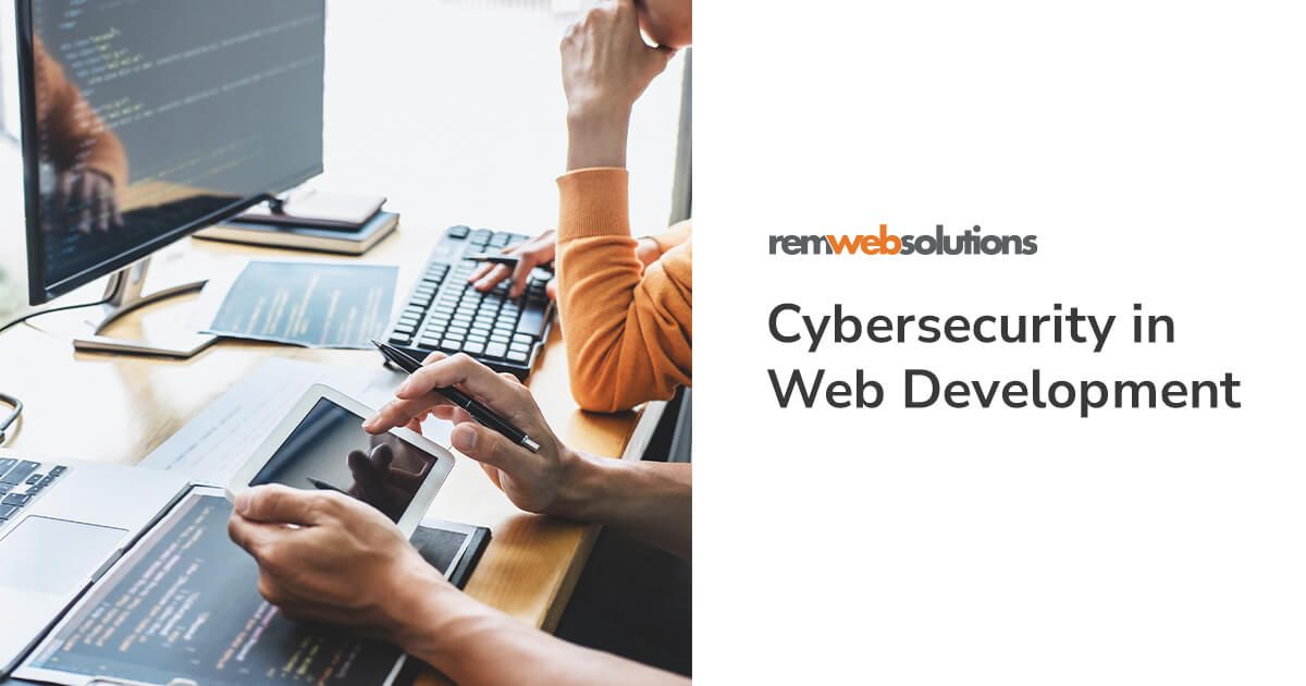 Web developers on tablet and desktop computers. "Cybersecurity in Web Development" REM Web Solutions